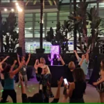 Corporate event guests participating on the dance floor.